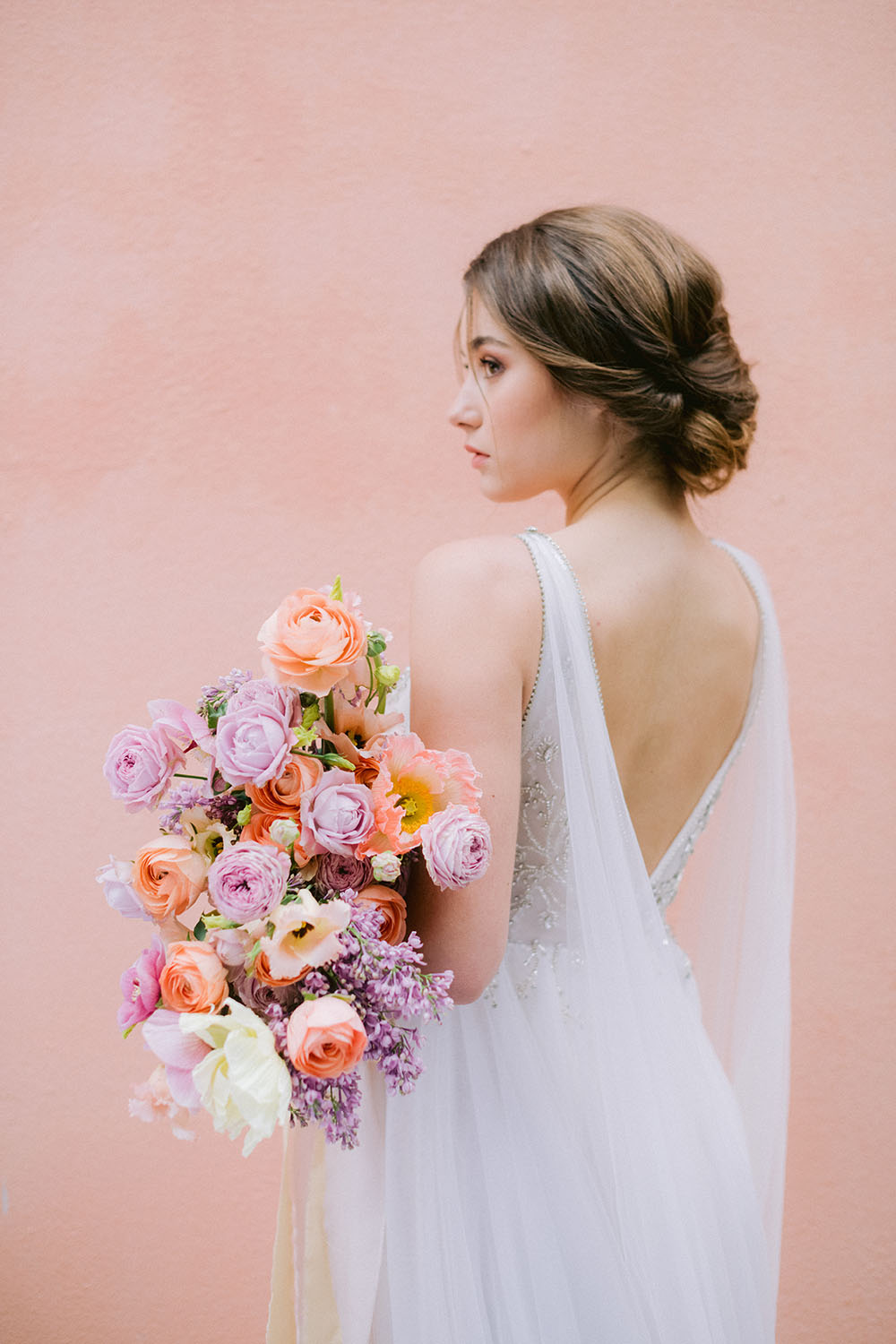 bride with wedding bouquet by esther lamarche